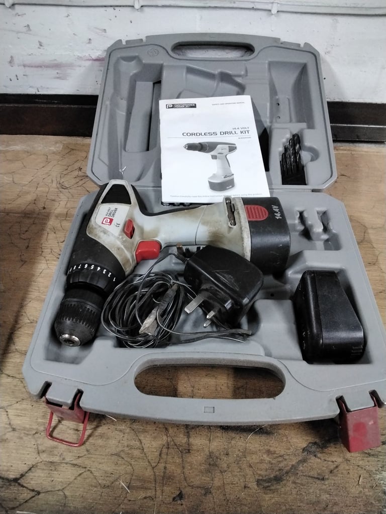 Performance cordless drill 14.4v including case battery and charger