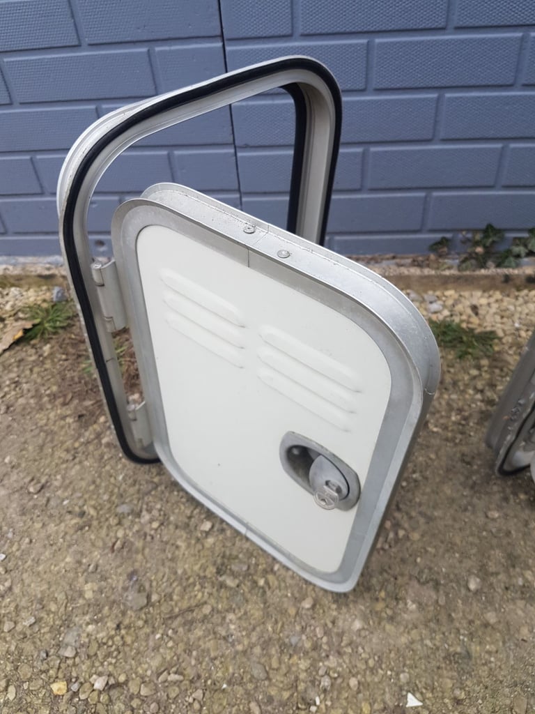 Various side doors with frames and keys for caravan camper motorhome - gas, toilet, storage.