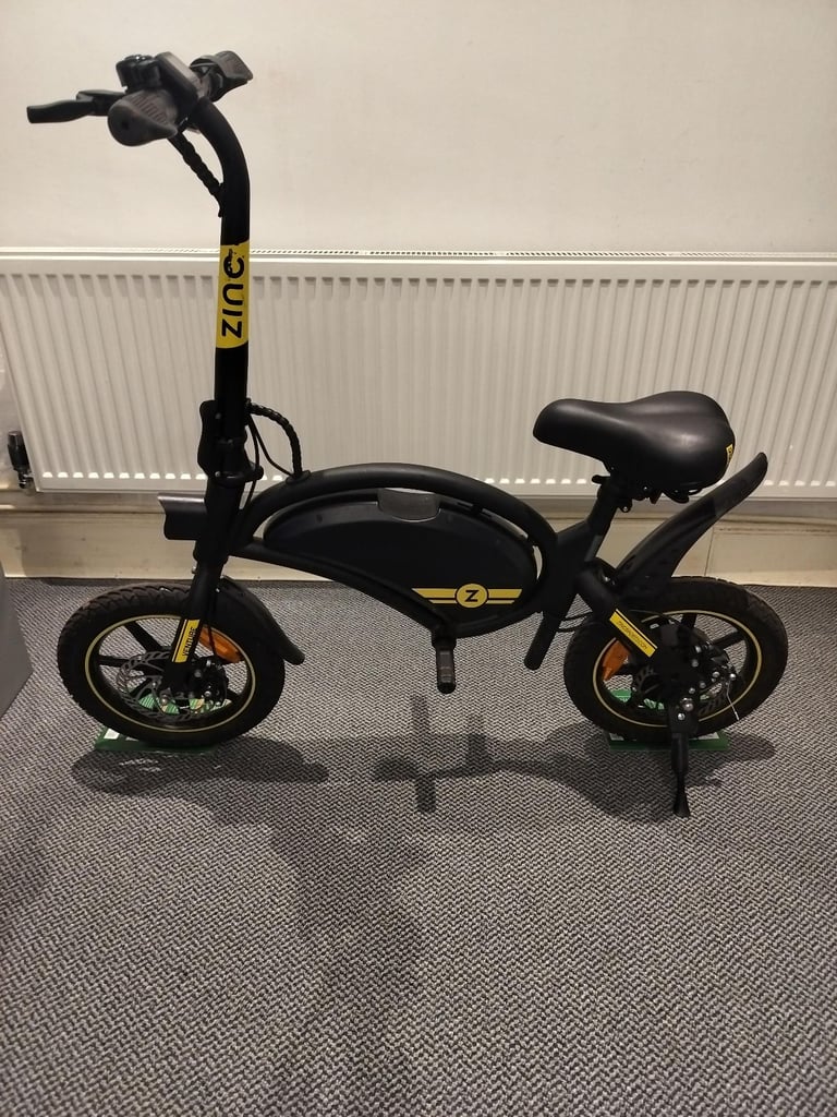 Zinc electric seated scooter good condition