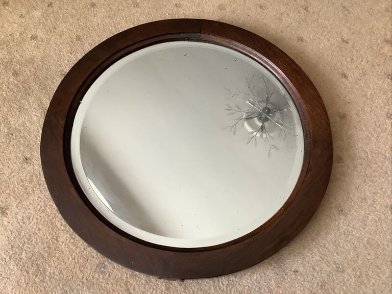 round old wall mirror 