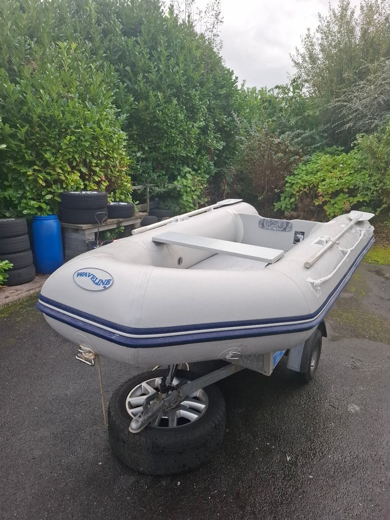 image for Waveline sib boat with mariner 4hp outboard