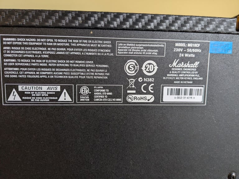 Electric guitar Cort Z44 and Marshall MG10CF amplifier - both barely used