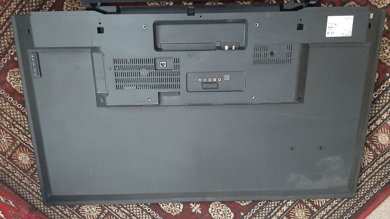 SONY 48" A++ Rated Smart TV + Stand, Original charger and Remote in good condition (Vertical lines)