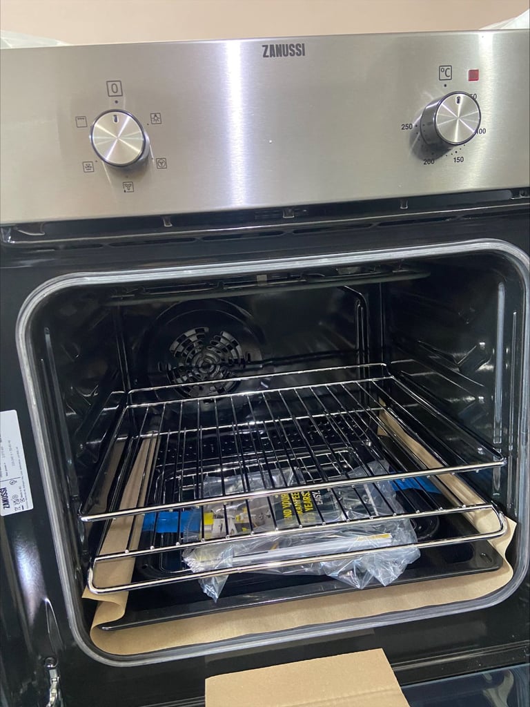 image for  ZANUSSI 60CM-SILVER-ELECTRIC OVEN-S/S-INTEGRATED-13 A PLUG IN-FAN OPERATED-EASY CLEANING-WOW!!