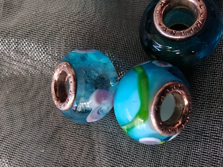 Collection of 5 Teal Glass Charms by Charm Company for bracelet.