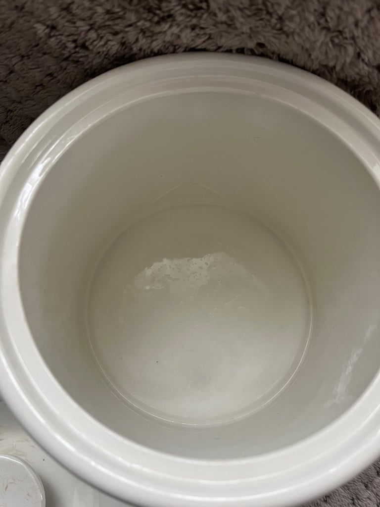 White ceramic jar with lid