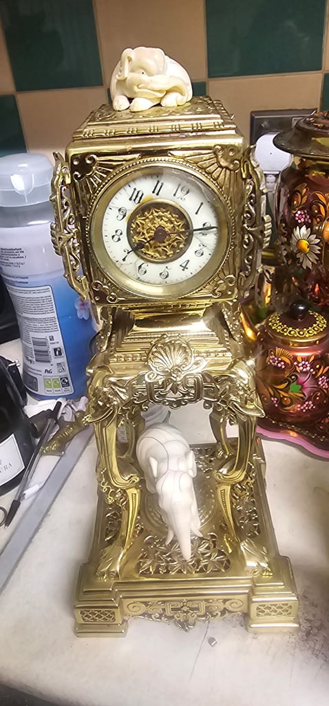 Solid brass antique clock