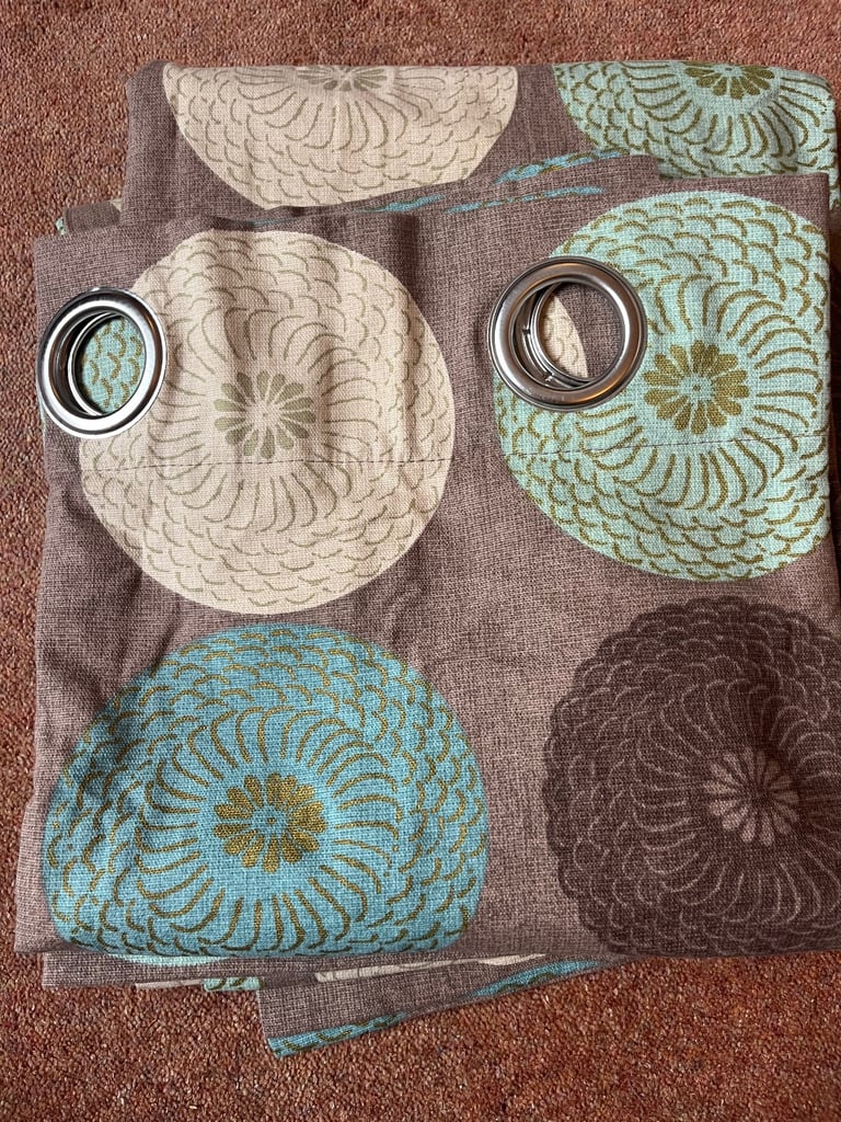 Pair of curtains circular pattern with eyelets  