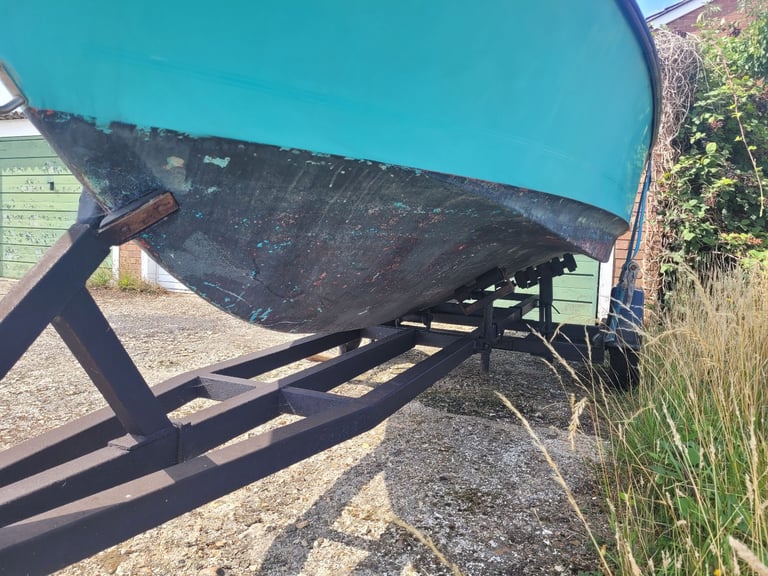 Shetland 460 cabin boat and road trailer.