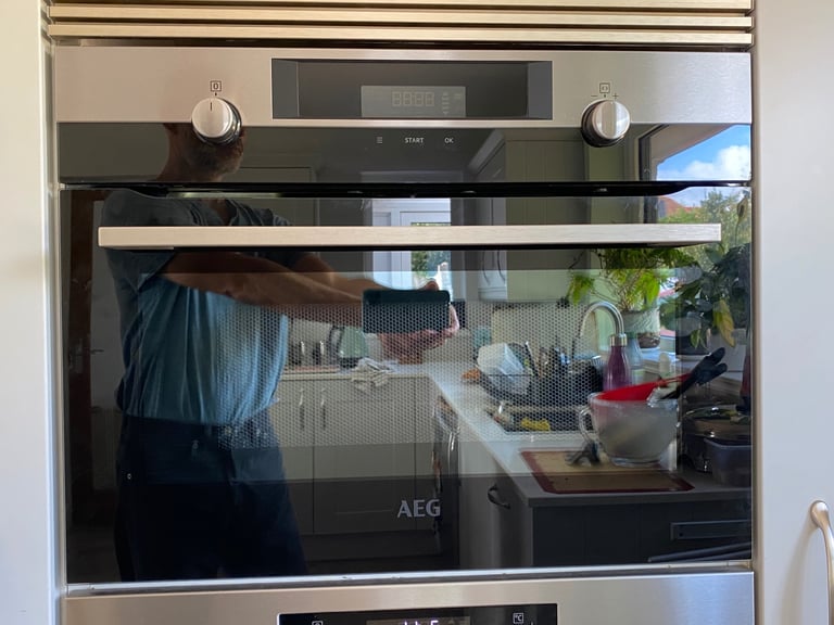 AEG Inox microwave door glass assembly (Ropley SO24)