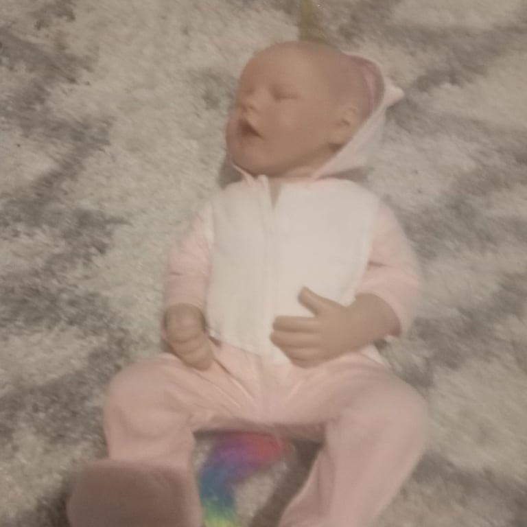 image for Baby reborn doll with unicorn onesie 