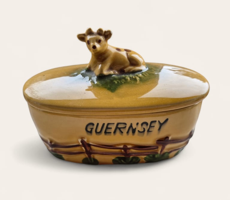 image for Collector's Guernsey cow butter dish, has 2 small chip round rim not visible when lid is on. 
