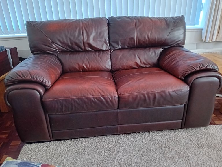Leather sofas, chair and footstool