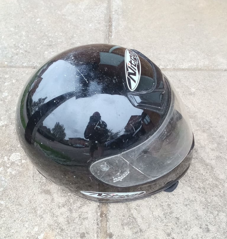 Black motorbike helmet