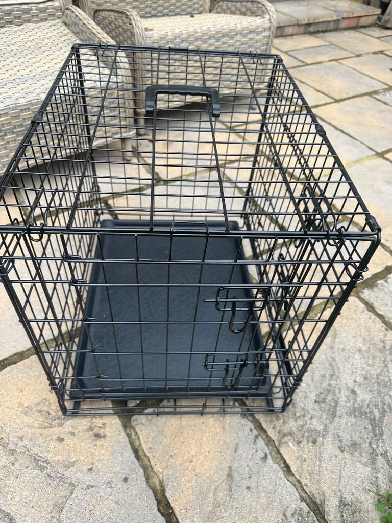Lovely black dog crate for small/toy dog.
