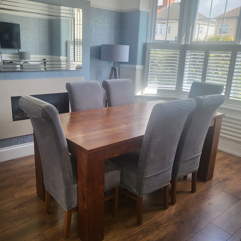 Dinning table & 6 chairs with extra covers