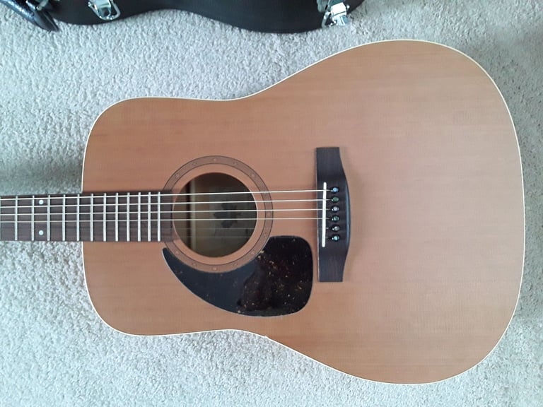 Left handed Norman B18 acoustic guitar, made in canada.