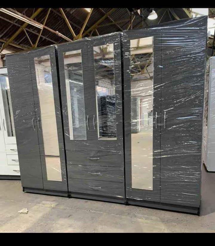 Modern Bedroom Furniture. Bedroom Suit Includes Bedside Tables, Chest of Drawers and Wardrobes