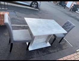 4-seater Grey Dining table with 2 chairs 
