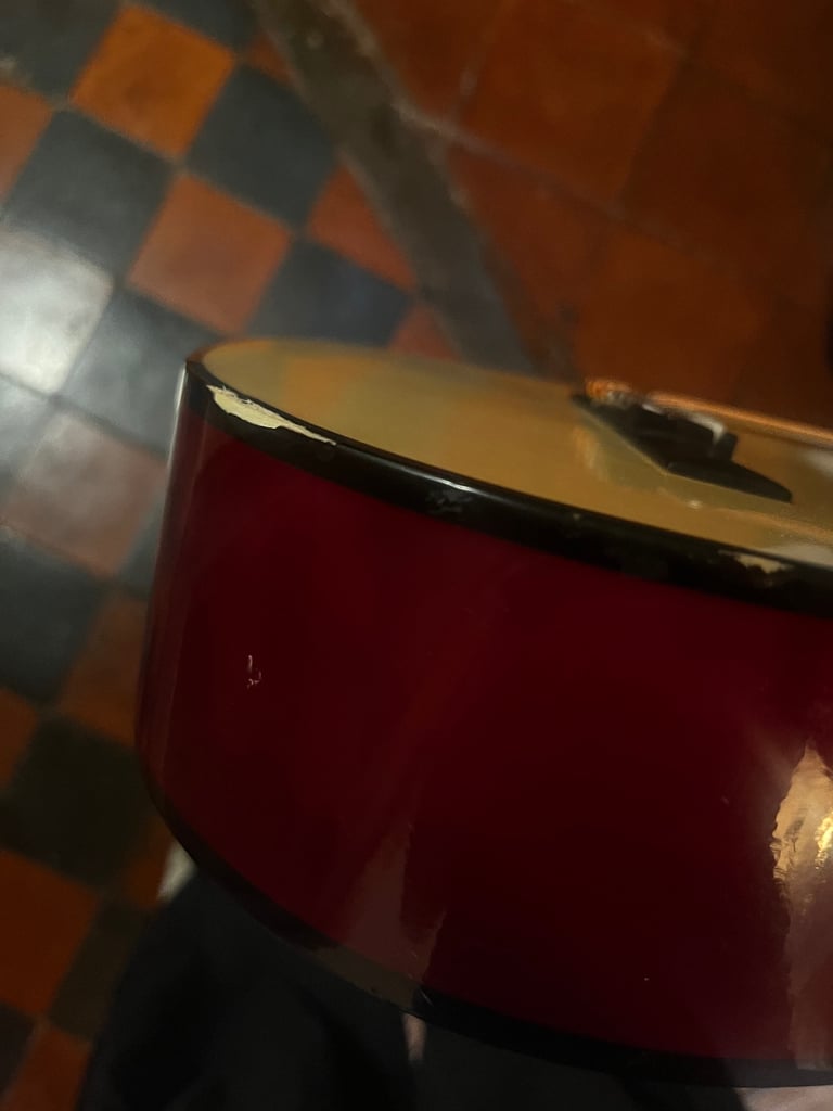 Children’s guitar with carry case