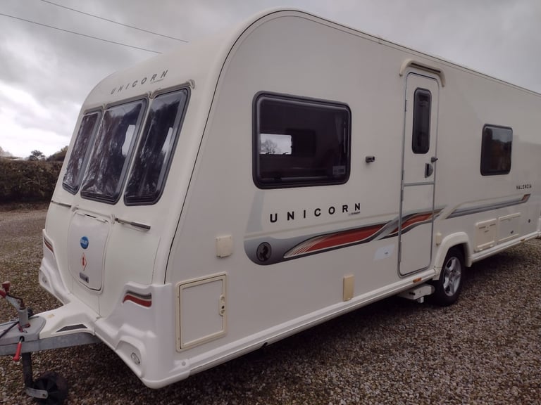 Bailey unicorn Valencia 2012 caravan fixed bed motor mover awning 