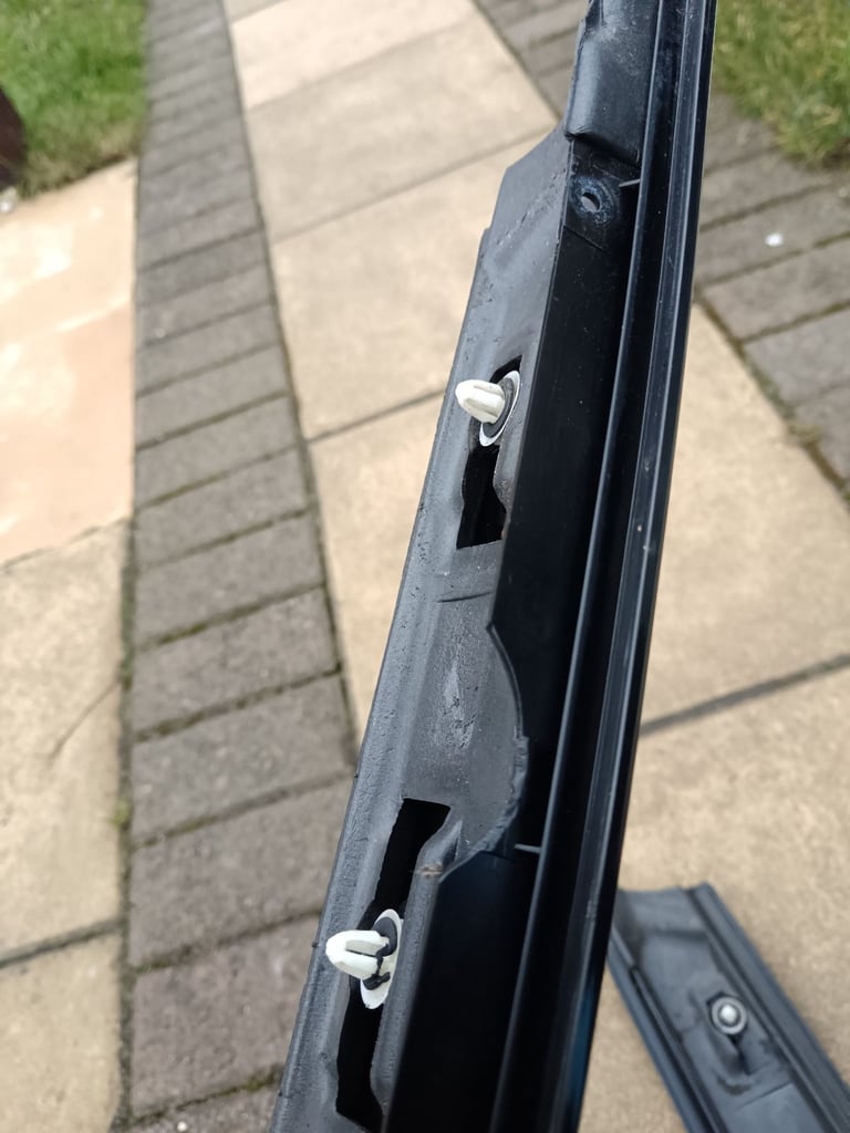 Mini R52 Apiller plastic trim. Drivers side has a bit missing where a screw attaches 