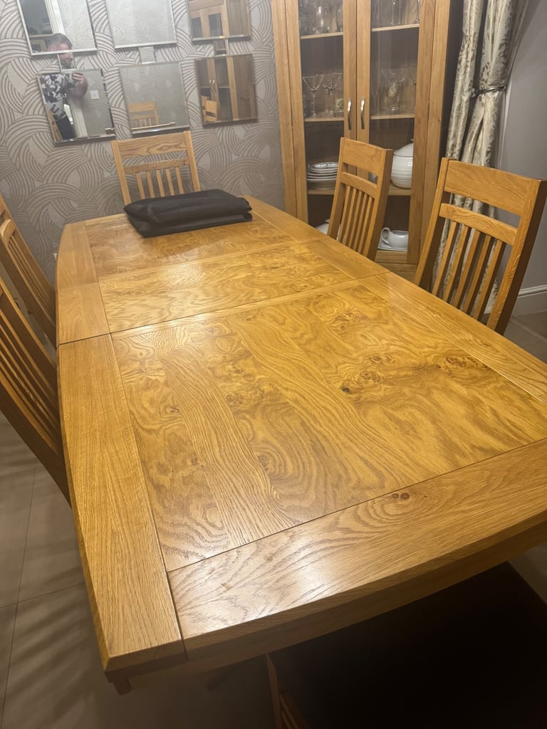 Extending Oak Dining Table with 8 matching chairs