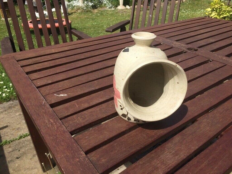 TWO SALT PIGS ONE LARGE AND ONE WITH A WOODEN SPOON £3 EACH