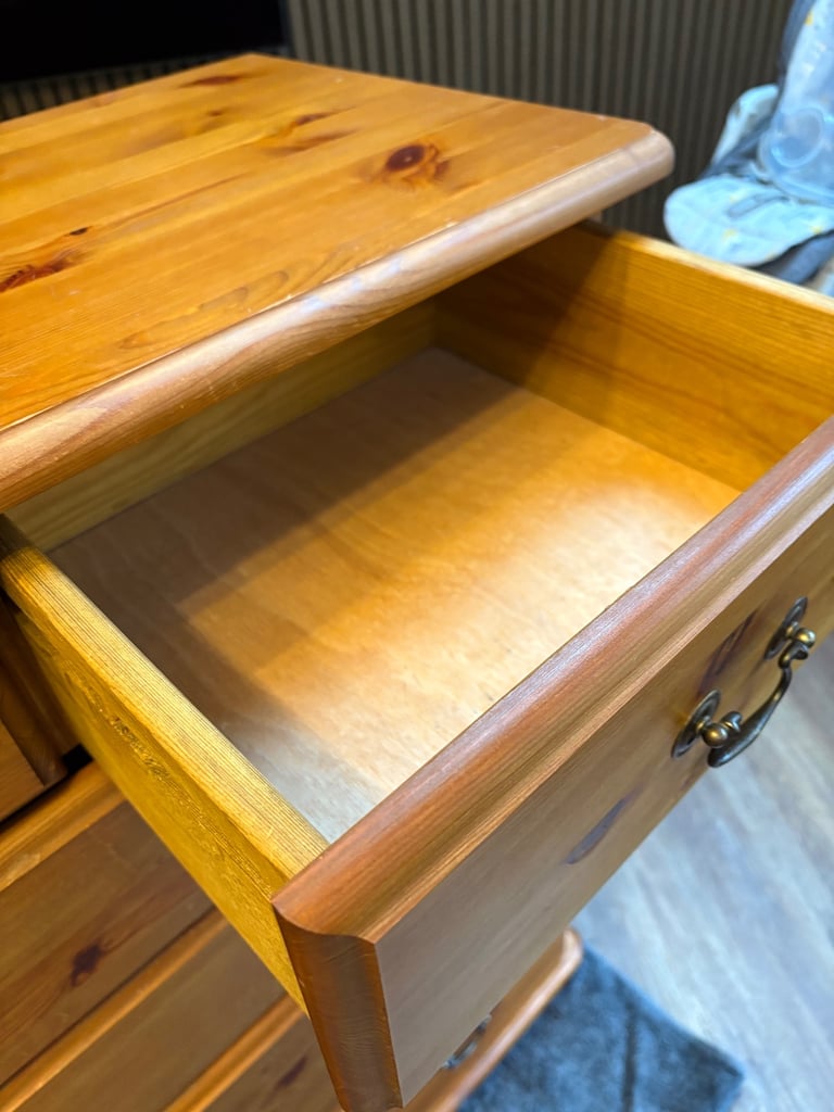 Bedside table with three drawers