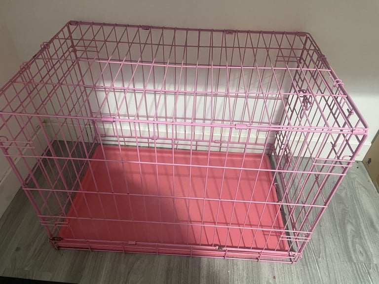 Pink dog cage 