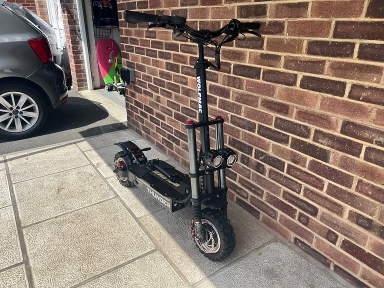 Wolf H9 Atv all terrain military grade 5200 watt e scooter 2 wheel drive 62 volt 60 mph