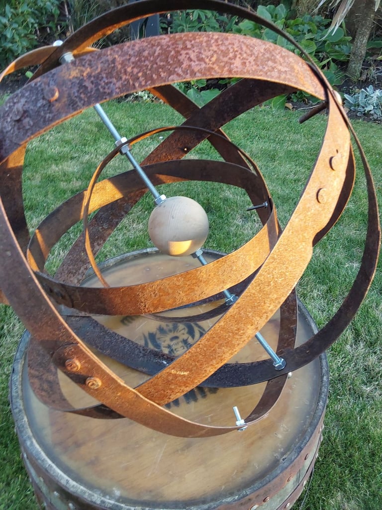 Garden art from whisky barrel materials 