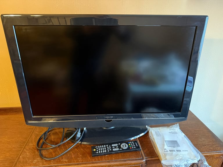 Hitachi 32” TV (32LD4550U) with remote and books