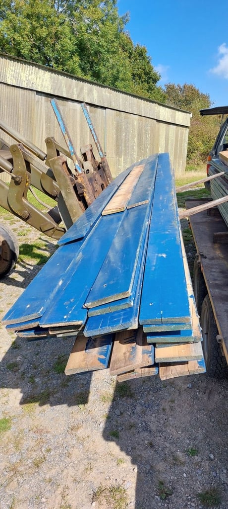 used salvaged wooden beams and posts