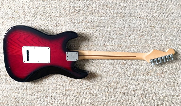 Fender Stratocaster. 1990 Strat Plus Deluxe. American. Rosewood. Crimson. Exceptional.