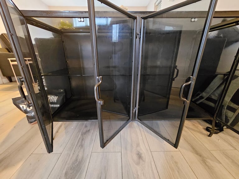 Black glass industrial sideboard.