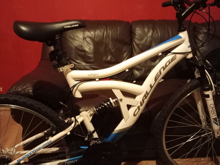 image for Shimano challenger mountain bike excellent condition  just need back wheel pumped up