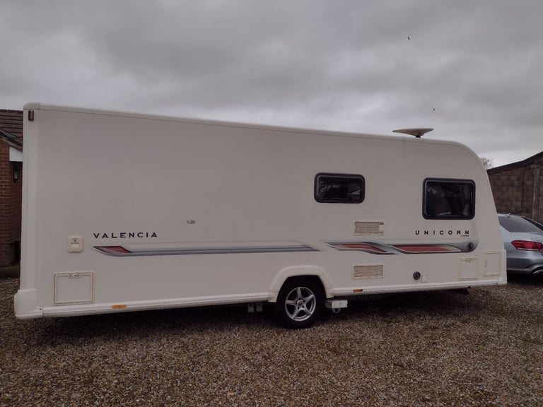 Bailey unicorn Valencia 2012 caravan fixed bed motor mover awning 