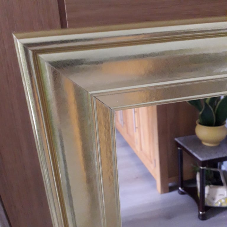 GOLD FRAMED MIRROR, COULD DELIVER.