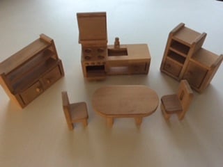 Wooden dolls house with furniture 