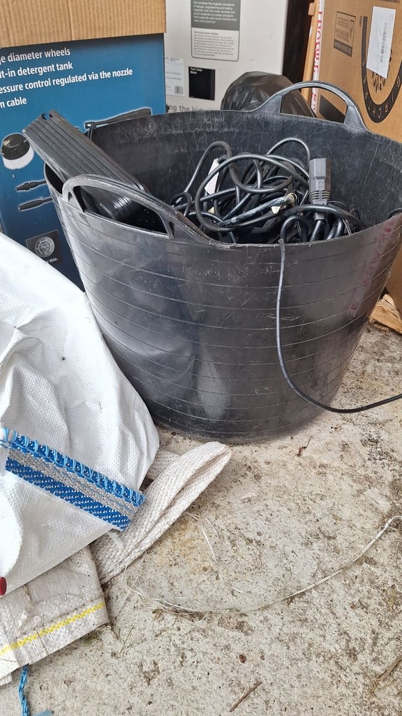 Tub of old computer wires and power units