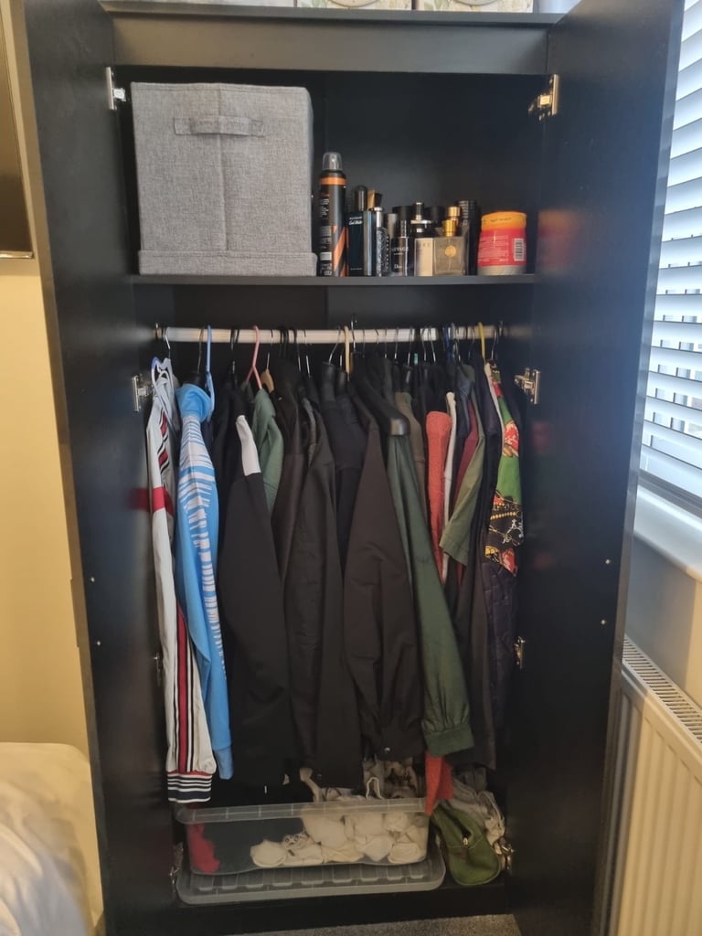 Black wardrobe with mirror