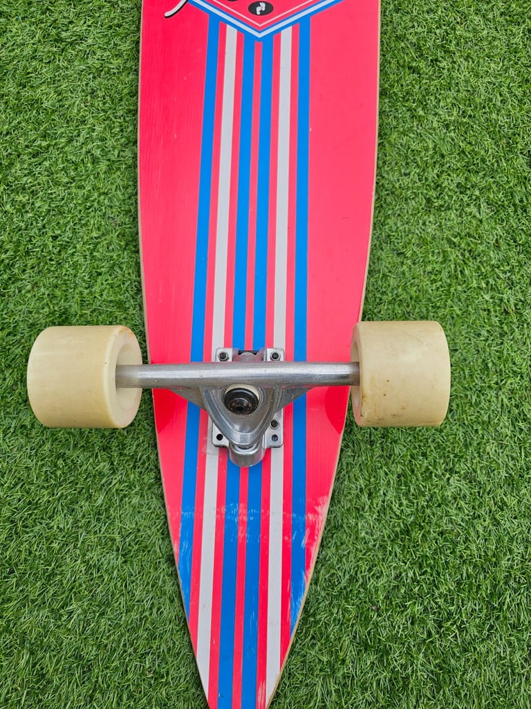 Two bare feet longboard skateboard 