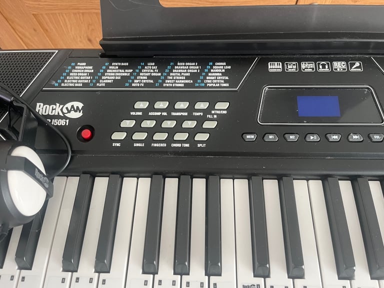 Electric keyboard stand stool headphones 