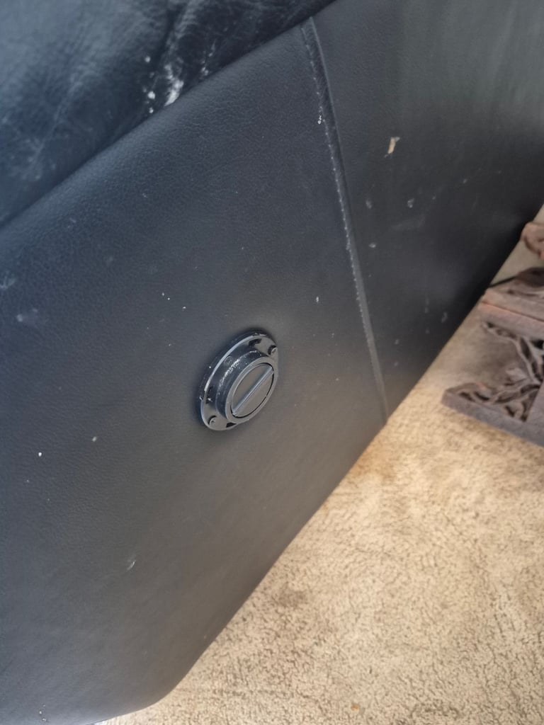 Black leather reclining 3 seater sofa 