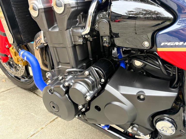 2010 / 10 Honda CB1300 John McGuinness £8500 White 9070 miles.