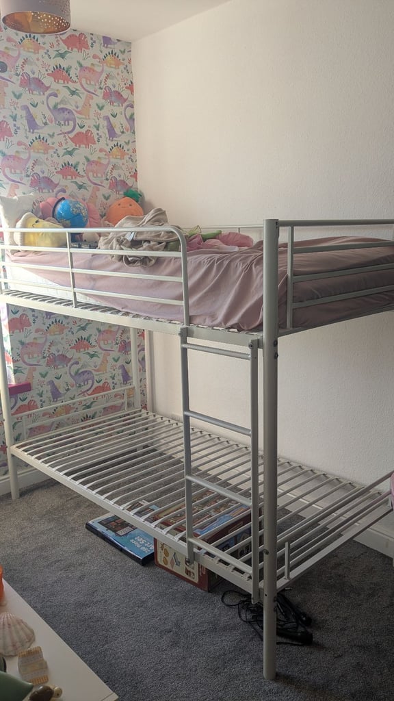 White metal single bunk beds