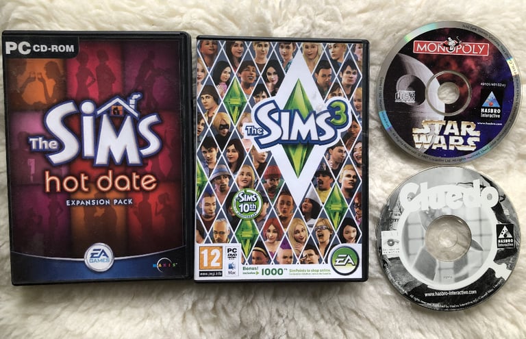 10 PC GAMES & PES2015 & 6 kids DVDs; Sims3,Monopoly,Tomb Raider,Football Manager, Star Wars