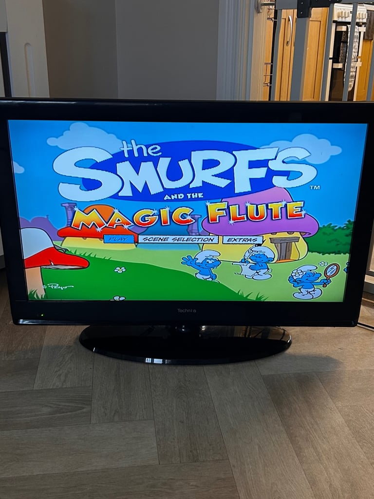 image for Tv/ dvd combi and 37 cartoon / movies dvds