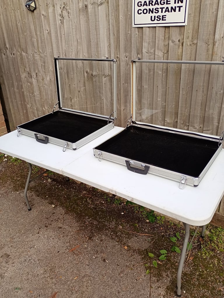 image for Two large aluminium display cases and foldaway table